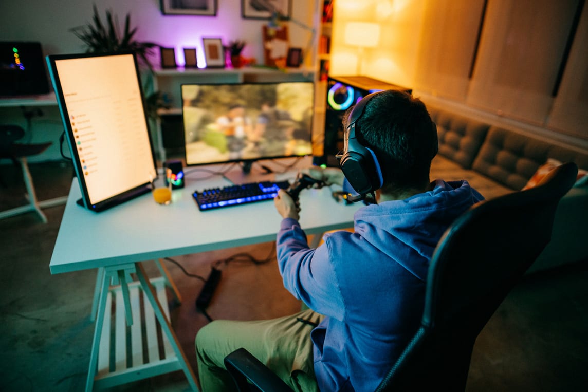 Young man playing online game