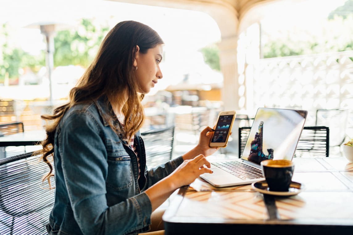 Woman using phone to hotspot