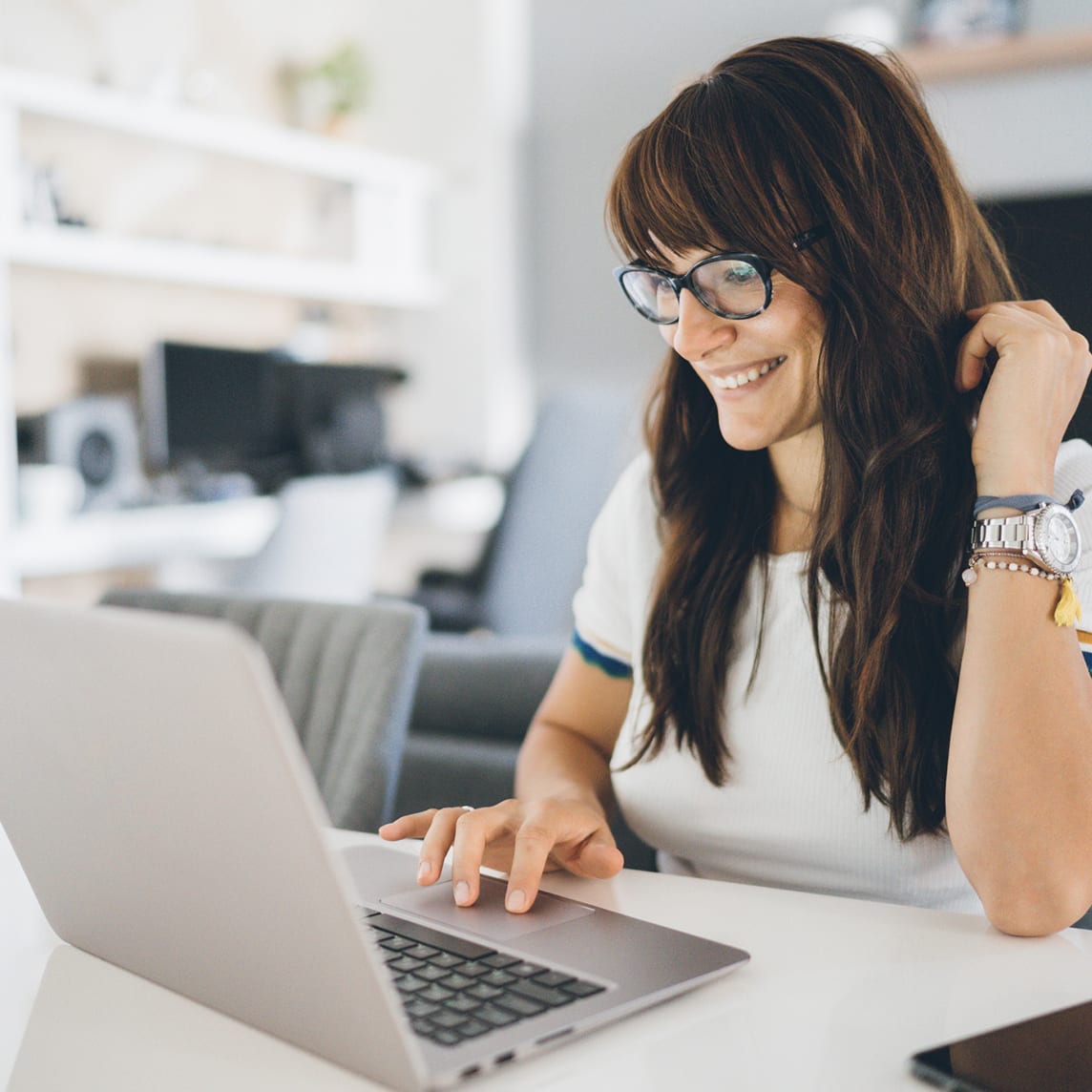 woman working from home with at&t internet