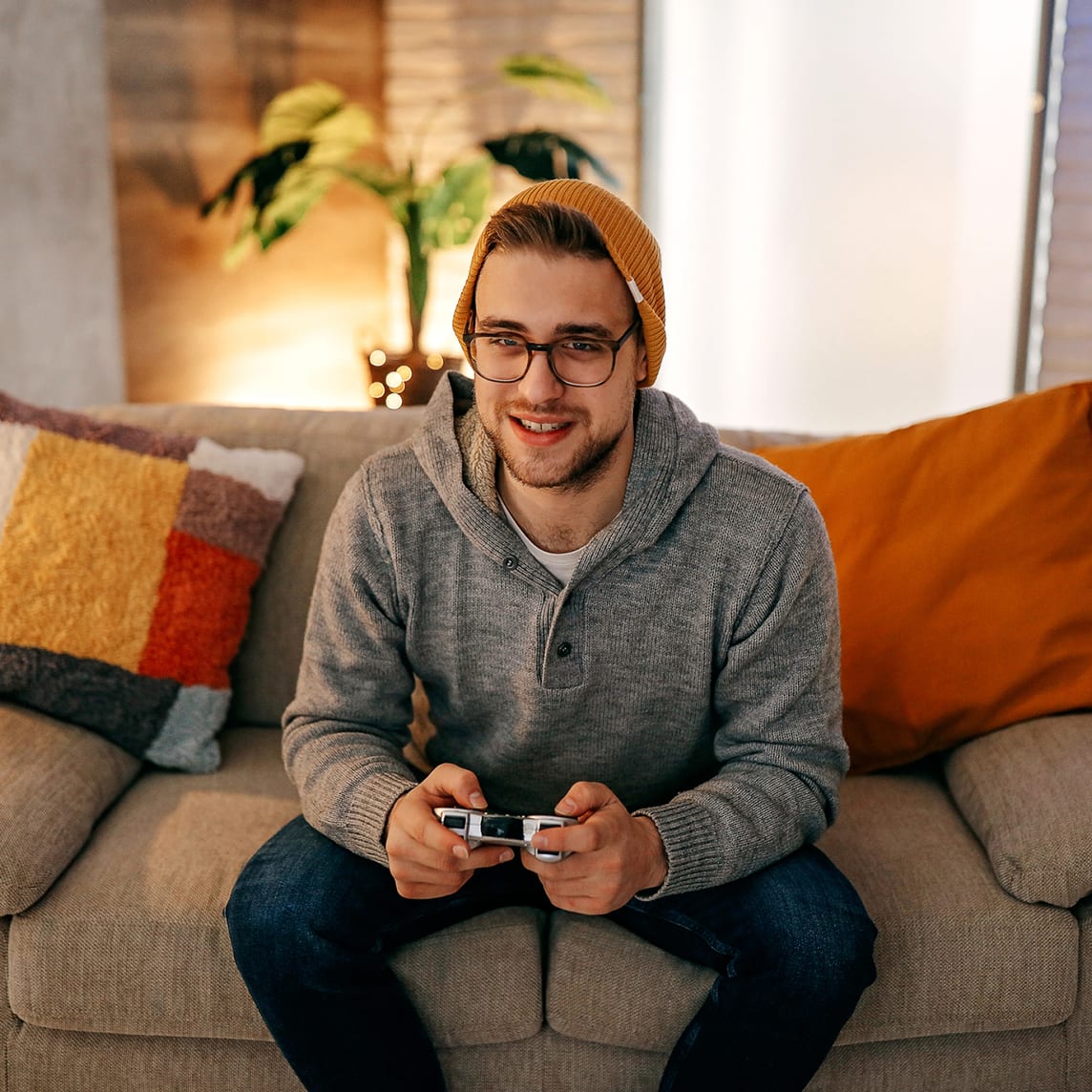 young man playing a video game